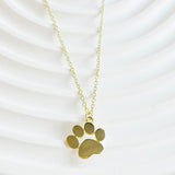 Collar con pata dorada para los amantes de los perros