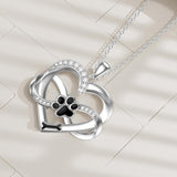 Collar Infinity con corazón y huellas de patas, de plata: joya con motivos animales simbólicos