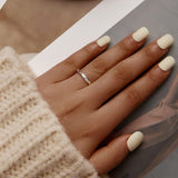 Anillo con huella de pata fabricado en plata de ley