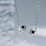 Collar con forma de pata «Amor infinito» con circonitas