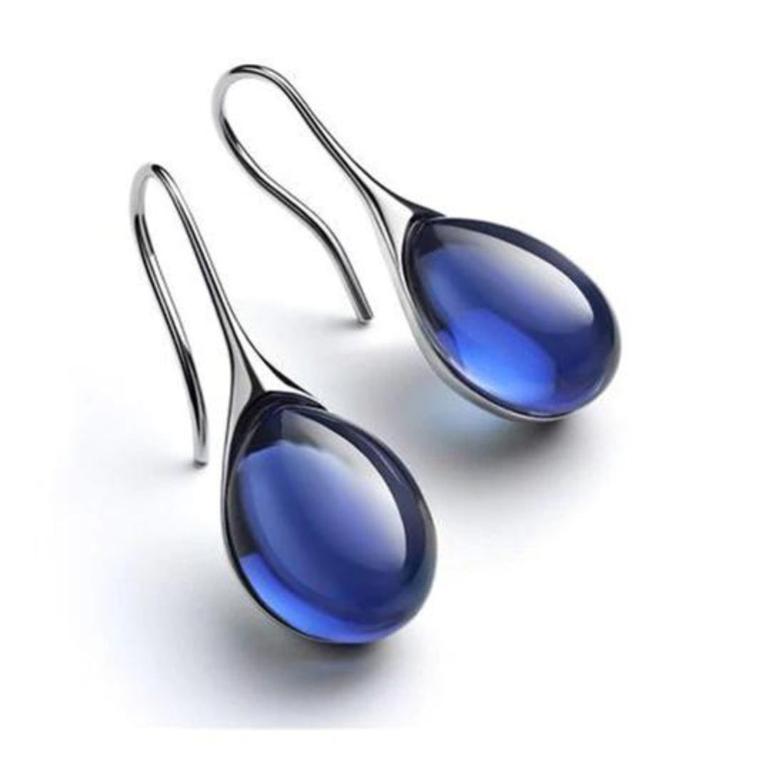 Pendientes de gota de cristal en oro y plata