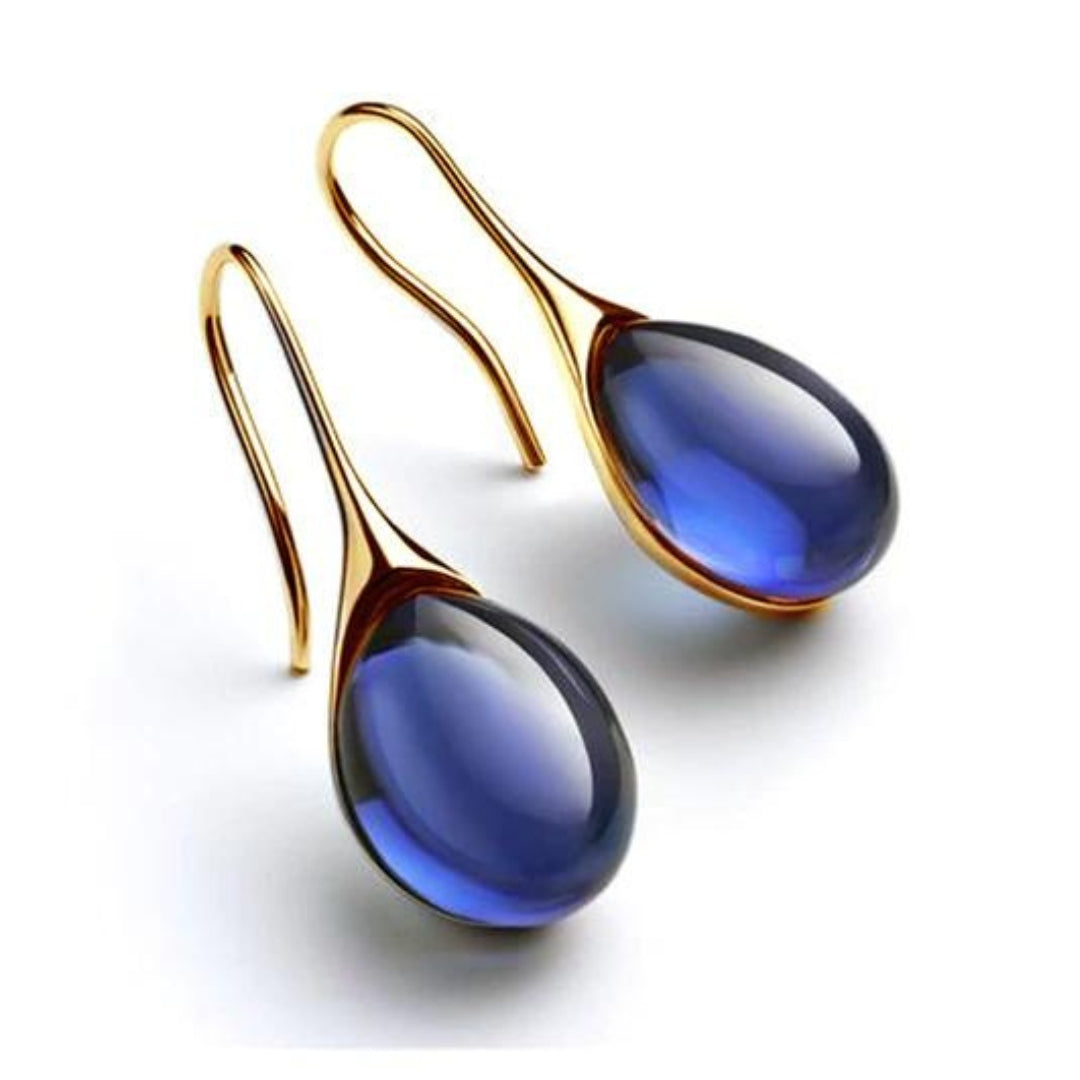 Pendientes de gota de cristal en oro y plata