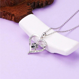 Collar con una bonita pata de perro en forma de corazón, de acero inoxidable