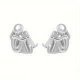 Pendientes bonitos, bicolores y envolventes, de plata y oro