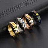 Anillo antiestrés giratorio con patitas – Anillo de acero inoxidable con colores del arcoíris