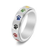 Anillo antiestrés giratorio con patitas – Anillo de acero inoxidable con colores del arcoíris