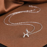 Collar Balloon Dog: collar femenino y divertido con un colgante de animal, en color dorado