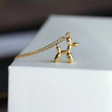 Collar Balloon Dog: collar femenino y divertido con un colgante de animal, en color dorado