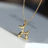 Collar Balloon Dog: collar femenino y divertido con un colgante de animal, en color dorado