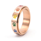 Anillo antiestrés giratorio con patitas – Anillo de acero inoxidable con colores del arcoíris