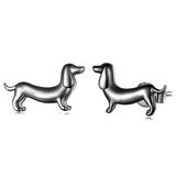 Pendientes de perrito hechos de plata