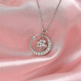 Collar de plata con forma de pata de perro y circonitas