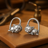 Pendientes de cachorro durmiendo, en plata de ley