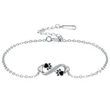 Pulsera con el símbolo del infinito, con un colgante con forma de huella y circonitas